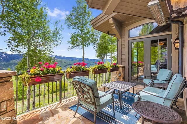 46 Jasmine, Avon, CO 81620 - wooden terrace with a mountain view and french doors