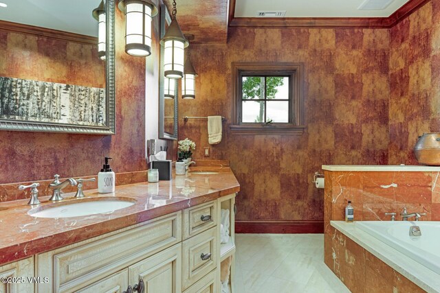 46 Jasmine, Avon, CO 81620 - bathroom with double vanity, a garden tub, and crown molding