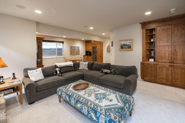 living room featuring light colored carpet