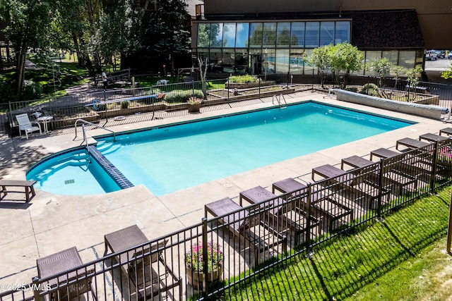 3931 Bighorn Rd Unit 5-E, Vail, CO 81657 - view of pool with a pool with connected hot tub and a patio area