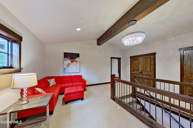 living room featuring lofted ceiling with beams, carpet, and a chandelier