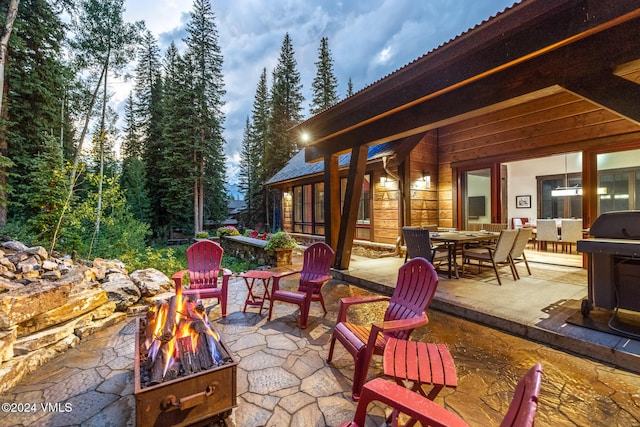 view of patio featuring a fire pit