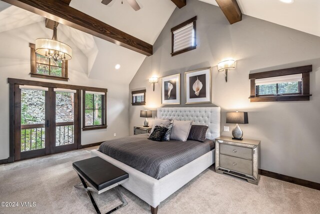 carpeted bedroom with multiple windows, beam ceiling, access to outside, and high vaulted ceiling