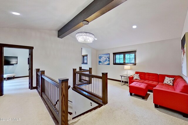 interior space with a chandelier and vaulted ceiling with beams