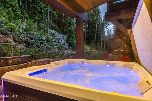 view of patio / terrace featuring a hot tub