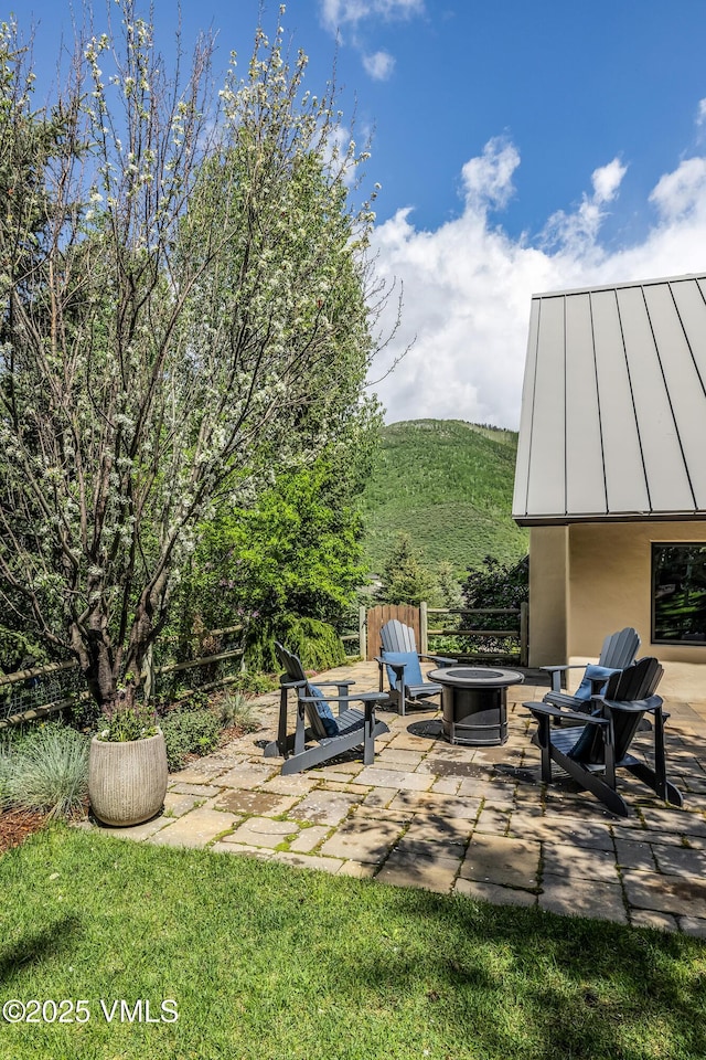 2036 Vermont Rd, Vail, CO 81657 - view of patio / terrace with an outdoor fire pit