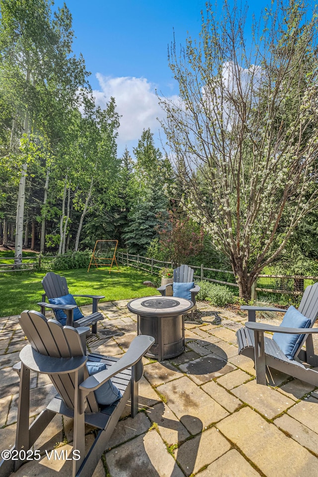 2036 Vermont Rd, Vail, CO 81657 - view of patio featuring an outdoor fire pit and a playground