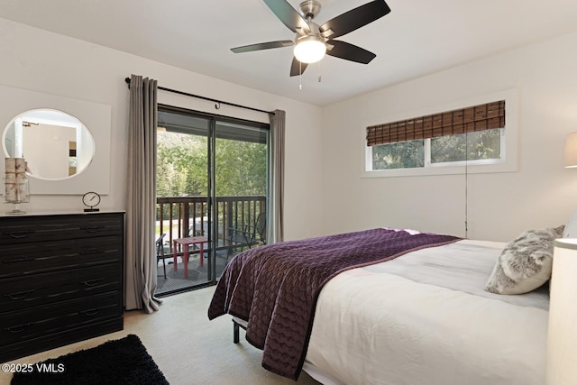 2932 Bellflower Dr Unit B, Vail, CO 81657 - bedroom with light carpet, access to exterior, multiple windows, and ceiling fan