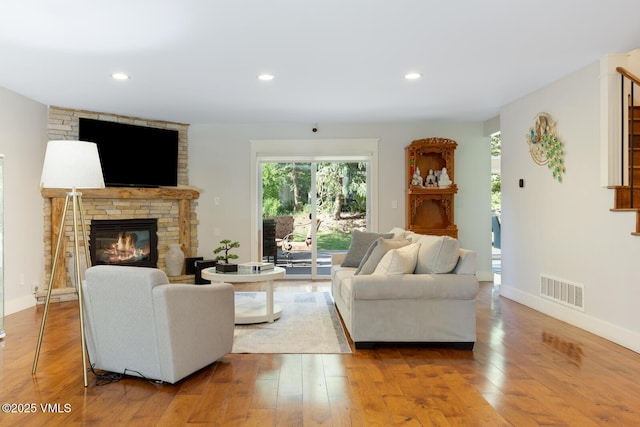 50 Hereford Rd, Edwards, CO 81632 - living area with a large fireplace, wood finished floors, and recessed lighting