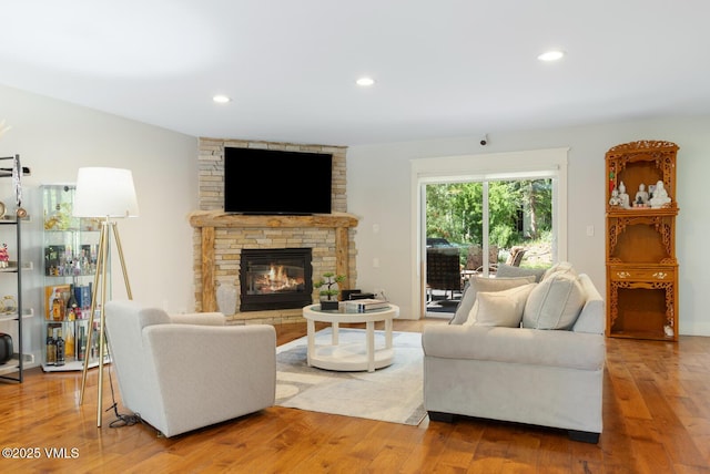 50 Hereford Rd, Edwards, CO 81632 - living area featuring wood finished floors, a fireplace, and recessed lighting