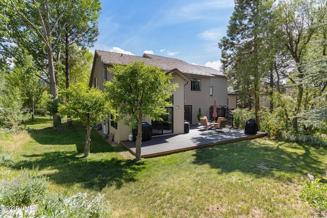 50 Hereford Rd, Edwards, CO 81632 - back of house with a deck, a lawn, and stucco siding