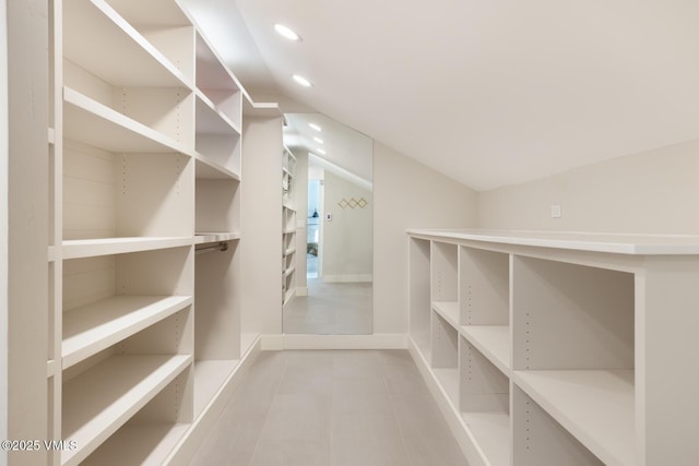 50 Hereford Rd, Edwards, CO 81632 - walk in closet featuring lofted ceiling and tile patterned floors