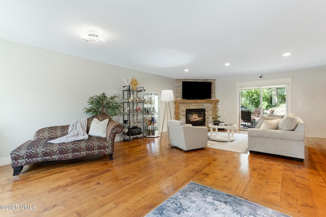 50 Hereford Rd, Edwards, CO 81632 - living area with wood finished floors, a large fireplace, and recessed lighting