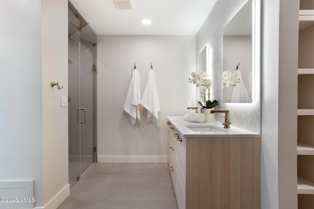 50 Hereford Rd, Edwards, CO 81632 - bathroom with double vanity, a shower stall, and recessed lighting