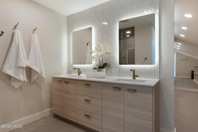 50 Hereford Rd, Edwards, CO 81632 - full bath with double vanity, recessed lighting, and backsplash