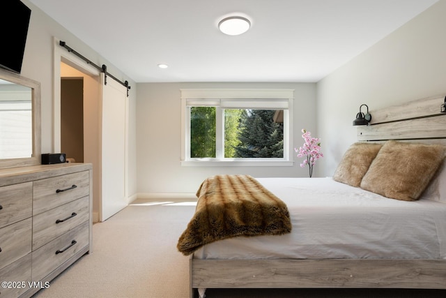 50 Hereford Rd, Edwards, CO 81632 - bedroom with a barn door and light colored carpet