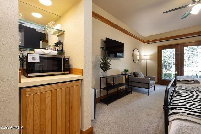 120 Offerson Rd Unit 3002, Beaver Creek, CO 81620 - bedroom featuring carpet flooring, french doors, a textured wall, access to exterior, and ceiling fan