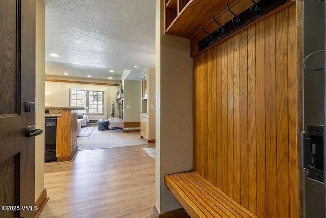 120 Offerson Rd Unit 3002, Beaver Creek, CO 81620 - mudroom with light wood-type flooring, a textured ceiling, recessed lighting, baseboards, and a relaxing sauna