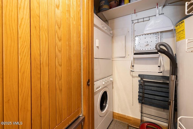 120 Offerson Rd Unit 3002, Beaver Creek, CO 81620 - laundry room featuring stacked washer / dryer and baseboards
