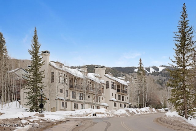 view of snow covered property