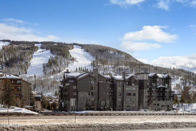 exterior space featuring a mountain view