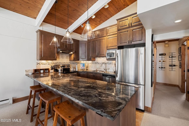 kitchen featuring under cabinet range hood, stainless steel appliances, tasteful backsplash, and lofted ceiling with beams