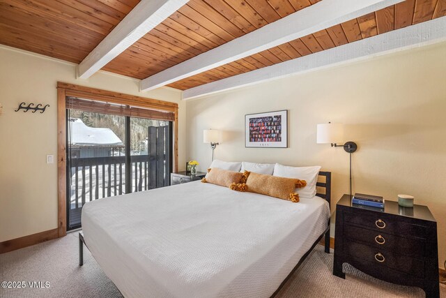 carpeted bedroom featuring baseboards, beam ceiling, wood ceiling, and access to exterior