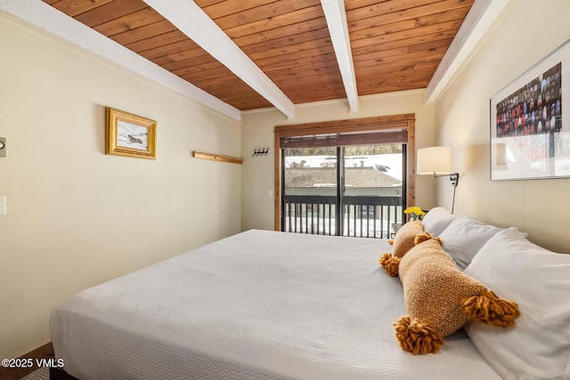 bedroom featuring beamed ceiling, access to exterior, and wooden ceiling