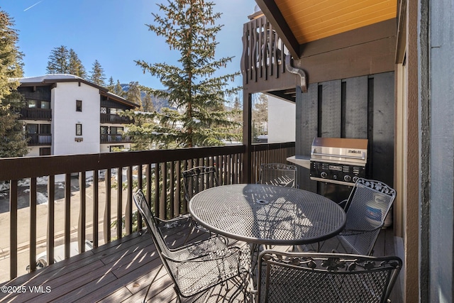 deck featuring outdoor dining space