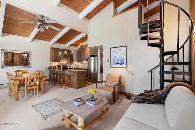 living room with beam ceiling, high vaulted ceiling, light carpet, a ceiling fan, and wooden ceiling