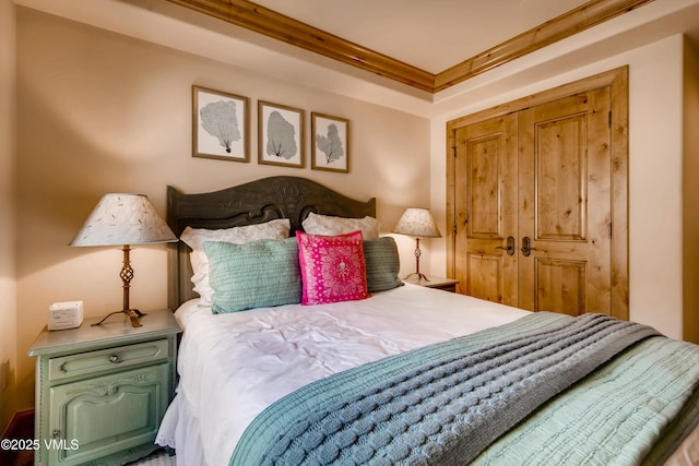 434 S Frontage Rd E Unit 403, Vail, CO 81657 - bedroom featuring ornamental molding