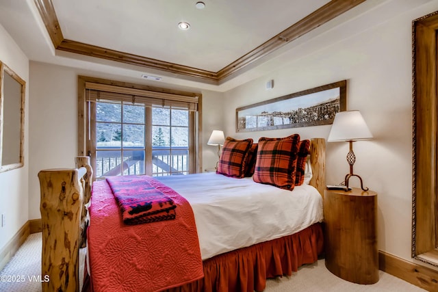 434 S Frontage Rd E Unit 403, Vail, CO 81657 - carpeted bedroom featuring access to exterior, crown molding, and a tray ceiling