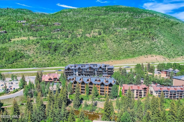 434 S Frontage Rd E Unit 403, Vail, CO 81657 - aerial overview of property's location with a mountain backdrop