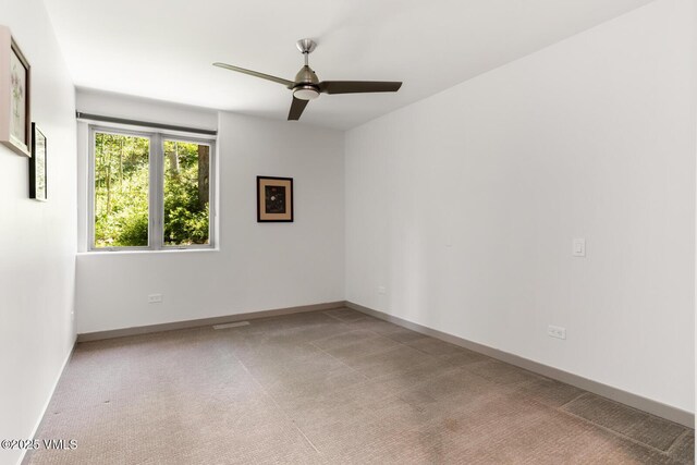 4916 Juniper Ln, Vail, CO 81657 - carpeted empty room featuring a ceiling fan and baseboards