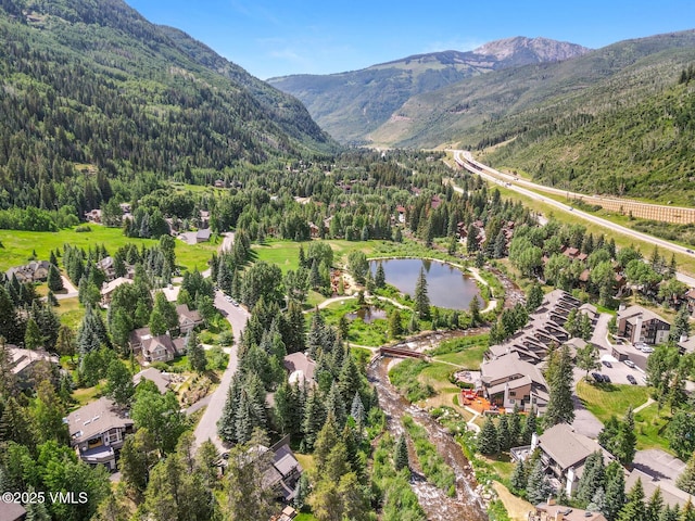 4916 Juniper Ln, Vail, CO 81657 - aerial view of residential area featuring a forest and a water and mountain view