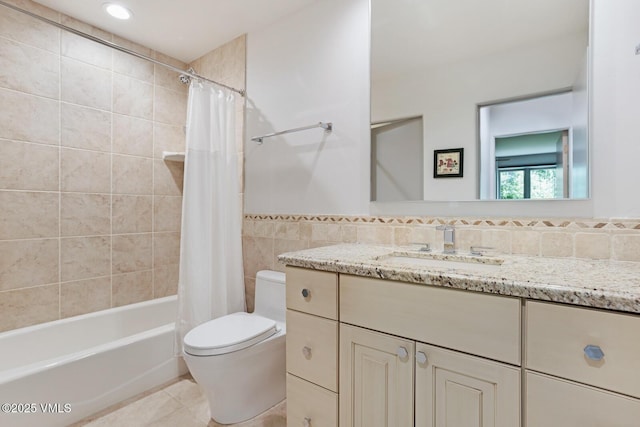 4916 Juniper Ln, Vail, CO 81657 - full bathroom with tile walls, tile patterned floors, vanity, and shower / tub combo with curtain