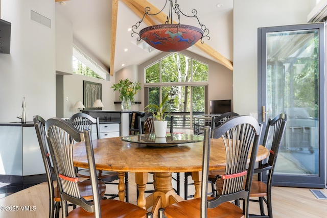 4916 Juniper Ln, Vail, CO 81657 - dining area with light wood-type flooring and high vaulted ceiling