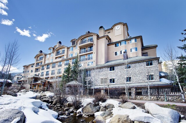 view of snow covered building