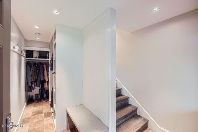 3930 Fall Line Dr Unit 12, Vail, CO 81657 - stairway featuring recessed lighting and stone finish flooring