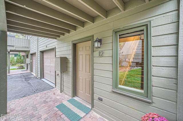 view of patio with a garage