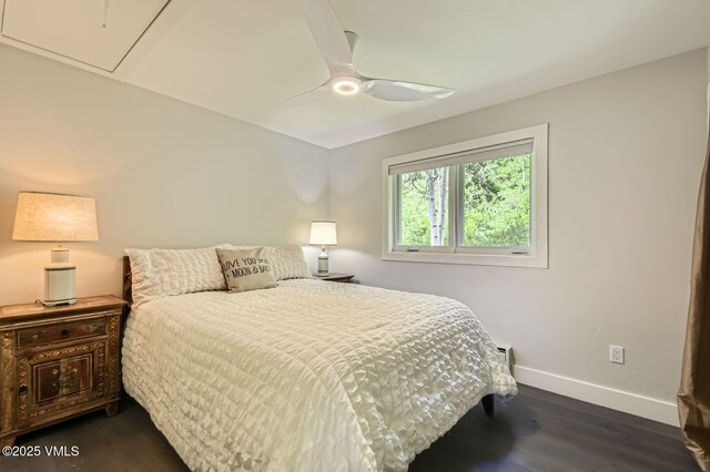 3930 Fall Line Dr Unit 12, Vail, CO 81657 - bedroom featuring dark wood finished floors, attic access, and a ceiling fan
