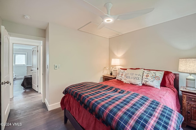 bedroom with ceiling fan and dark hardwood / wood-style flooring