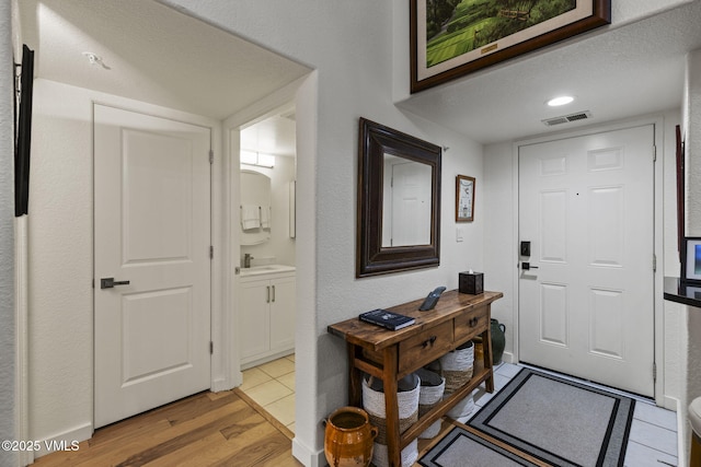 55 River Pines Ct Unit A302, Edwards, CO 81632 - entrance foyer with light wood-style floors