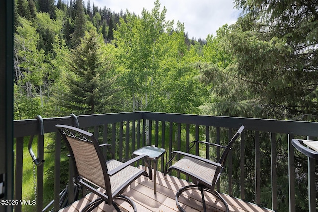 4470 Timber Falls Ct Unit 1407, Vail, CO 81657 - wooden deck with a view of trees