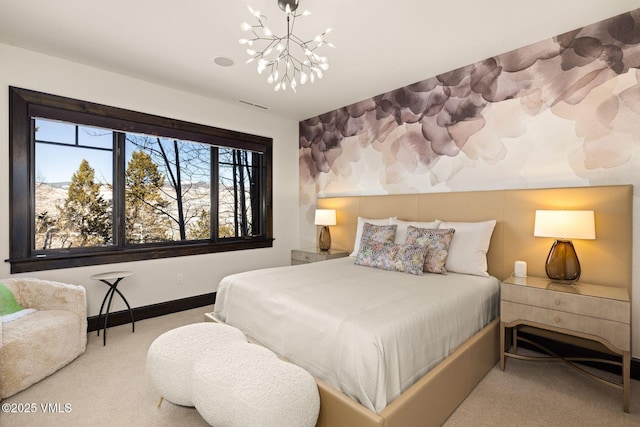 bedroom featuring baseboards, a notable chandelier, and carpet flooring