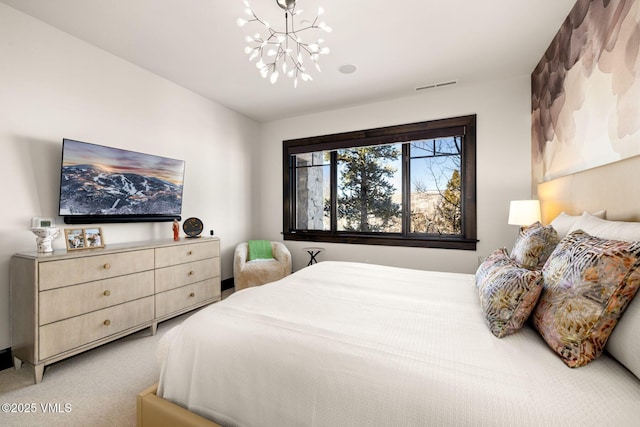 bedroom with visible vents, light carpet, and an inviting chandelier