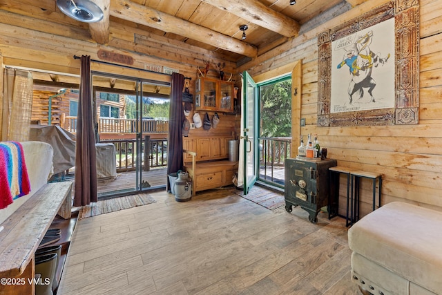 245 Main St, Eagle, CO 81631 - entryway featuring a wooden ceiling with exposed beams, hardwood / wood-style flooring, and wooden walls