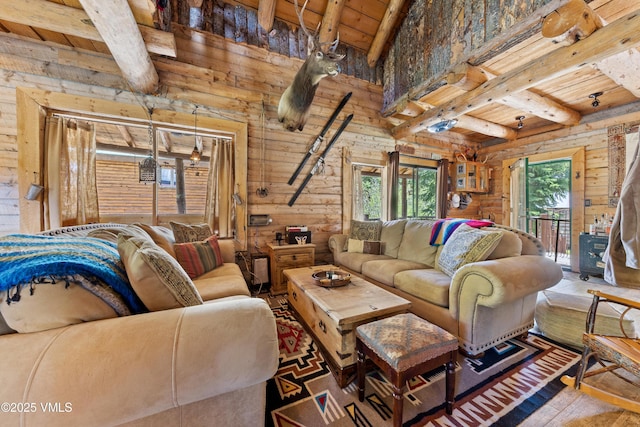 245 Main St, Eagle, CO 81631 - living area with a wooden ceiling with exposed beams, plenty of natural light, and wood finished floors