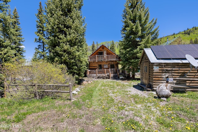 245 Main St, Eagle, CO 81631 - view of yard with a storage unit and a balcony