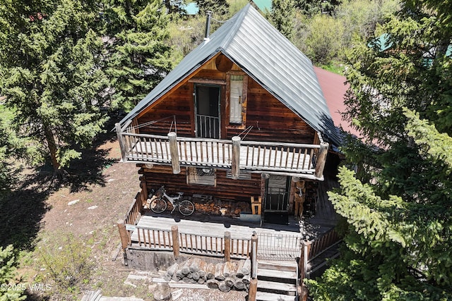 245 Main St, Eagle, CO 81631 - view of front of house with a balcony and a metal roof